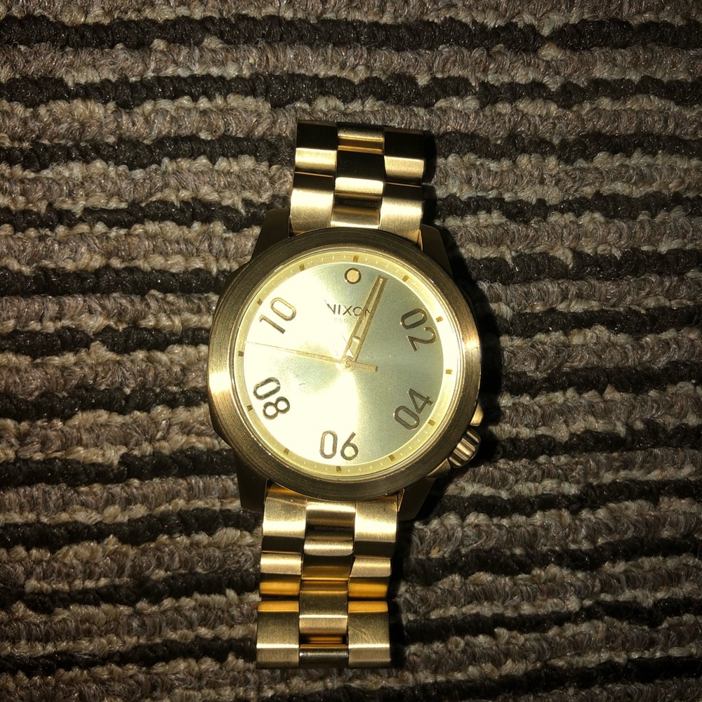 Men’s 16 K Gold Nixon Watch